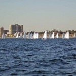 The women’s fleet sails upwind with speed in front the Long Beach city front during the ICSA/LaserPerformance Singlehanded National Championship 2012.